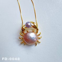 ✿ Item: Handmade Crab Pendant Necklace with Natural Freshwater Pearl  ✿ Pearl Color: Natural untreated，Pink ，White，Gold，Purple，Blue，with Wonderful iridescent luster ✿ Accessories material: 14K Gold Plating，Luxurious gold layer over sterling silver for added elegance and durability. ✿ Pendant shape: Crab ✿ The handmade Pendant Necklace come in a fine gift bag, Ideal gifts for Halloween to your girlfriend, daughter, wife, and mom to express your sincere love. ✿ We strive to provide you with high-q Ocean-inspired Shell Pearl Necklace For Gift, Ocean-inspired Pearl Necklace For Gifts, Ocean-inspired Pearl Pendant Jewelry Gift, Ocean-inspired Gold Shell With Pearl Pendant, Crab Necklace, Ocean-inspired Shell-shaped Pearl Pendant Jewelry, Crab Jewelry, Marine Jewelry, Ocean Theme Jewelry