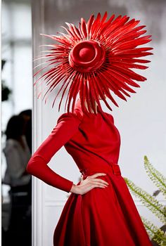 Wonderful red feather hat . . . suppose she is wearing Ruby Slippers with that outfit? Dior 1950s, Red Feather, Feather Hat