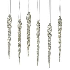 five silver ornaments hanging from chains