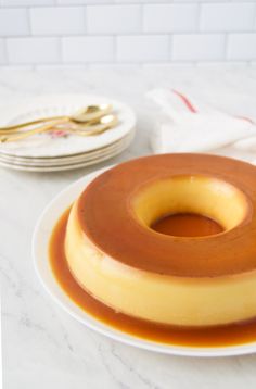 a cake on a plate with caramel sauce