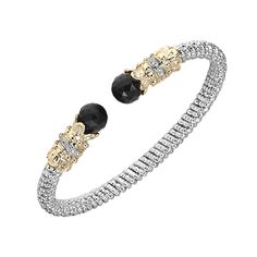 STUNNING! The open style, the twisted rope texture and the two multifaceted black onyx stones at each open end make this the perfect style for a modern-diva-meets-chic-fashionista type of woman. The black onyx sparkles and glimmer from its intricate facets. The easy to slip on bracelet is 6 mm wide and the two 14K Yellow Gold sleeves that envelop the onyx beads feature .12 ctw diamonds. All it needs is a woman that dresses it up or down. It looks astonishing both ways. Click here to download Vah Vahan Jewelry, Rope Texture, Color Stones Jewelry, Diamond Bracelet Design, Black Onyx Stone, Black Bracelets, Onyx Bead, Onyx Stone, Sparkle Diamonds