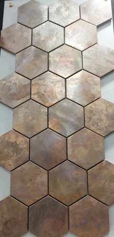 some kind of hexagonal tile that looks like it is made out of metal