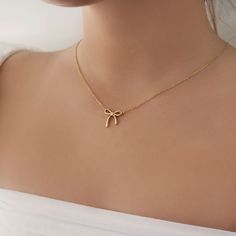 Dainty Ribbon Pendent Necklace  - This listing is for pair os the Dainty Ribbon Pendent Necklace. Perfect for everyday and layering - Length: 16" + 2" extender  - Base Material: High Quality Stainless Steel - Finish: 18K Gold - Nickel Free and Tarnish Free - All our jewelry is packaged in gift ready boxes. If you would like multiple items from your order packaged separately please let us know! © 2024 Generation of Daughters Gold Necklace Women Simple, Elegant Pendant Charm Necklaces, Dainty Pendant Charm Necklace, Gold Pendant Jewelry Simple, Pendent Necklace Pendants, Gold Necklace Aesthetic, Minimalist Accessories Jewellery, Gold Necklace Stack, Pendent Gold