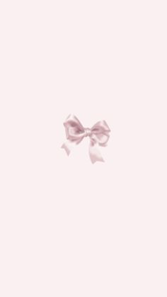 a pink bow on a white background