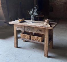 a wooden table with baskets on it