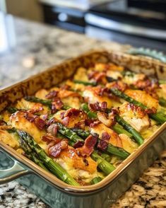 a casserole dish with asparagus and bacon