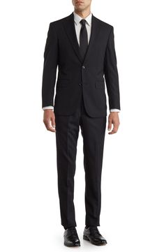 Whether it's an office occasion or a special event, this dapper suit crafted from luxurious wool with a classic design can do it all. 29 1/2" jacket length; 36 1/2" inseam; 15" leg opening; 9 1/2" front rise (size 34W) Jacket is lined; trousers are lined to the knee 100% wool Dry clean Imported Model stats: 6'1" height, 32" waist. Model is wearing size 40R. Business Three-piece Suit With Single Button, Tailored Three-piece Suit For Semi-formal Events, Tailored Three-piece Suit For Semi-formal Occasions, Business Three-piece Single Breasted Suit, Business Three-piece Single-breasted Suit, Fitted Double Breasted Professional Suit, Slim Fit Professional Three-piece Suit For Formal Occasions, Three-piece Suit With Notch Lapel For Business, Formal Slim Fit Three-piece Suit With Pressed Crease