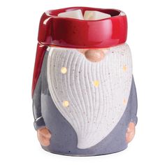 PRICES MAY VARY. DESIGN: Crafted from speckled ceramic and a glossy glaze, this delightful warmer features adorable details like gnome hands and a signature hat and beard. FUNCTION: Decorative electric fragrance warmer designed to warm scented wax and create the ambient glow of a burning candle. Includes NP5 Bulb included. USE: Warms fragrance melts and tarts. Roller switch for easy on/off is on the cord. This product has a reactive glaze or hand-painted design which gives each product a one-of- Round Nose, Home Fragrance Accessories, Oil Warmer, Warm Fragrance, Buy Candles, Wax Melters, Warm Christmas, Candle Warmer, Candle Wax Melts