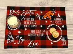 a placemat that has some food on it and is decorated with christmas words, such as carrots, pretzels, cookies