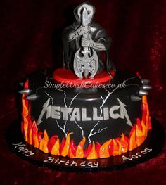 a cake that has been decorated to look like metallicocal on fire and flames