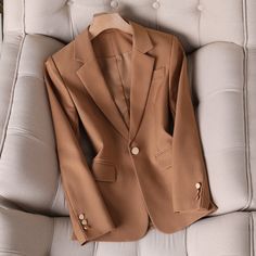 Product information : Version: slim type Length: ordinary style (50cm < length ≤65cm) Collar type: suit collar Sleeve length: long sleeves Popular elements: buttons Main fabric composition: polyester (polyester fiber) Color: single caramel suit jacket, single navy suit jacket, single khaki suit jacket Size Information: Size: S,M,L,XL,XXL,XXXL,XXXXL. Note: 1. Asian sizes are 1 to 2 sizes smaller than European and American people. Choose the larger size if your size between two sizes. Please allow Slim Fit Brown Outerwear For Work, Brown Slim Fit Outerwear For Work, Fall Slim Fit Blazer With Lapel Collar, Slim Fit Single Button Long Sleeve Blazer, Fall Slim Fit Single Breasted Suit, Fall Single Breasted Slim Fit Suit, Brown Office Blazer, Classic Brown Solid Color Outerwear, Classic Solid Color Blazer For Business Casual