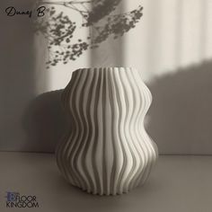 Modern and original 3D printed vase, exceptionally own unique design. Its shape resembles rising dunes, with smooth lines and graceful curves. This vase is an ideal addition to any interior, adding a touch of natural beauty and harmony. It can be used for flowers, decorative branches or simply as an independent element of decor. It is light-weighted and durable. This vase is used for dried flowers only. Please note that plants featured are not included. Dimensions: Hole diametr 9,5 cm (3,74 inches) Height 17,5 cm (6,89 inches) The width along the protrusion is about 16.5 cm (6,5 inches) The material from which our products are created is PLA is a fully biodegradable material obtained from renewable resources, it is created from lactic acid and cornmeal. The item is packaged carefully to en Dried Flowers Vase, Gift For New House, Ribbed Vase, Vase Modern, Flowers Vase, Branch Decor, Smooth Lines, Modern Home Decor, New House