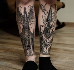 the legs of a person with tattoos on them