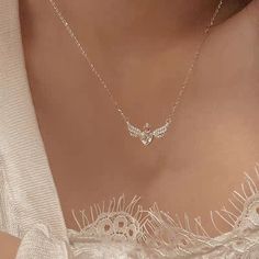 Crown Heart Angel Wings Necklace Add a touch of sweetness to your outfit with our Crown Heart Angel Wings Necklace. Made with love, this lovely necklace features a delicate crown and angel wings design, making it a perfect accessory for any occasion. Stay cute and elegant with this necklace on your neck. Angelic Jewelry, Angel Wings Necklace, Angel Wings Design, Wings Necklace, Angel Wings Heart, Angel Wing Necklace, Crystal Angels, Angel Aesthetic, Heart With Wings