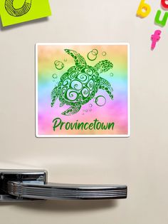 there is a sticker on the fridge that says prouncettoum with a sea turtle