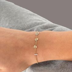 Celebrate the special moments in your life with a stunning 14kt gold number bracelet.  This elegant and delicate accessory features a sparkling chain and a date of your choice in beautiful letters. Whether it's your anniversary, your child's birth, your wedding date, or any other meaningful occasion, this bracelet will make you smile every time you wear it.  It's also a perfect gift for your loved ones on Valentine's Day, Mother's Day, Christmas, or any other celebration.  You can choose from wh Lady Diva, Date Bracelet, Number Jewelry, Beautiful Letters, Jersey Numbers, Bracelet Wedding, Sophomore Year, Gold Number, Pompano Beach