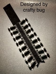 an advertisement for crafty bug with black and white stripes on the bottom, in front of a silver background