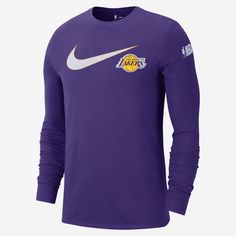 Nike and the Lakers. What more could you want? Show your love for the Los Angeles Lakers in this lightweight long-sleeve tee. Sporty Long Sleeve T-shirt With Team Logo, Long Sleeve Team Logo T-shirt For Streetwear, Nike Long Sleeve Tops Team Spirit, Nike Long Sleeve Tops With Team Spirit, Nike Long Sleeve Tops For Team Spirit, Sportswear Long Sleeve T-shirt With Logo Print, Long Sleeve T-shirt With Logo For Sports Events, Nike Long Sleeve Tops For Sports Events, Sportswear Long Sleeve Tops With Team Name