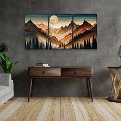 three pieces of artwork on a wall in a room with wood flooring and grey walls