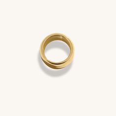 The 18K Gold Plated Maeve Ring, designed with simplicity in mind. The perfect accessory for every occasion. It looks beautiful on its own, or stacked with your other favourites, whatever you choose, you can't go wrong with this one. When you're not wearing this piece, tuck it away in your very own Milou jewellery box provided. Stainless Steel, plated with 18K Gold Waterproof (Tarnish Resistant) Natural Linen Milou Jewellery Box Included For ring sizing, please see our Size Guide for details FREE Everyday Rings In Recycled Gold, Open Ring Style, Everyday Open Ring In Recycled Gold, Recycled Gold Open Rings For Everyday Wear, Yellow Gold Open Midi Rings For Everyday Wear, Stackable Rings With Wide Band For Everyday, Timeless Wide Band Rings For Everyday Wear, Everyday Recycled Gold Open Rings, Everyday Brass Open Ring, Modern Rings In Recycled Gold, Tarnish Resistant