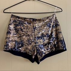 Bejeweled Stylish Shorts Navy With Gold/Rose Gold Fixed Sequins On Front 100% Polyester Zipper Closure On Back Made In Usa New With Tags Chic Sequin Party Shorts, Chic Gold Shorts For Party, Sequin Shorts For Party Season, Elegant Short Bottoms For Party, Short Sequined Bottoms For Party Season, Sequined Short Length Bottoms For Party Season, Embellished Party Bottoms For Summer, Glamorous High-waisted Shorts For Parties, Sequined High-waisted Shorts For Night Out