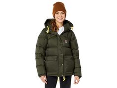 Fjallraven Expedition Down Lite Jacket - Women's Coat : Deep Forest : Enjoy the outdoors in the Fjällräven Expedition Down Lite Jacket. With its lightweight material, it is the perfect must-have for milder winter climates. Shoulders are reinforced with synthetic padding to prevent moisture and pressure. Outer fabric in hardwearing polyamide with PFC-free DWR (durable water repellent) Wind resistant, water-resistant. Snap-flap hand pockets with vertical zips. Inner stash pockets. Adjustable drawc Long Sleeve Puffer Jacket For Fall Outdoor Activities, Winter Camping Outerwear With Pockets, Winter Outerwear With Pockets For Camping, Fall Puffer Jacket With Pockets For Outdoor Activities, Fall Outdoor Puffer Jacket With Pockets, Green Puffer Jacket For Fall Outdoor Activities, Fall Puffer Jacket For Outdoor Activities, Casual Outerwear For Camping, Casual Solid Outerwear For Camping