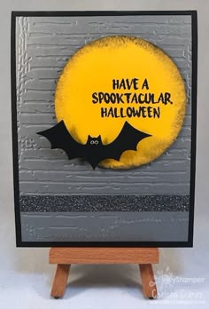 a halloween card with bats on it