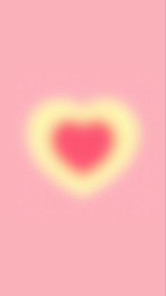 a heart shaped object on a pink background