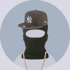 a baseball cap with a chain attached to it's face and wearing a new york yankees hat