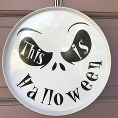 this is an image of a sign that says it's halloween on the side of a building