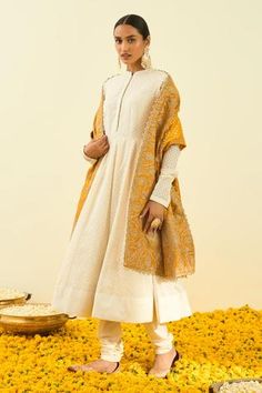 Glaze mustard dupatta with Kashmiri tilla embroidery in floral, paisley motifs and bead work hem.
Component: 1
Pattern: Embroidered
Type Of Work: Tilla
Fabric: Raw Silk
Color: Yellow
Other Details: 
Note: Kurta and pant worn by the model is not for sale
Occasion: Wedding,Mehendi - Aza Fashions Destination Wedding Colors, Tilla Embroidery, Wedding Mehendi, Paisley Motifs, Desi Clothes, Embroidered Dupatta, Sharara Set, Designer Gowns, Kids Sleepwear