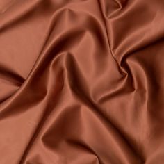 a close up view of a brown fabric