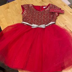 Brand New, With Tags - Gorgeous Sequin And Glitter American Girl Holiday Dress. Original Packaging Included. Size 10. Holiday Red Glitter Dress, Red Glitter Holiday Dress, Festive Sequin Dress For Dress-up, Festive Sequin Holiday Dress For Christmas, Festive Christmas Holiday Dress With Sequins, Christmas Sequin Holiday Dress, Christmas Sequined Holiday Dress, Holiday Sequin Glitter Dress For Dress-up, Holiday Sequin Glitter Dress