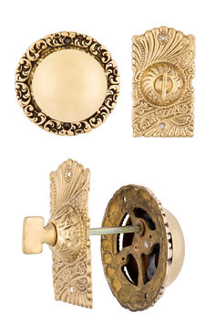 an assortment of decorative knobs and plates