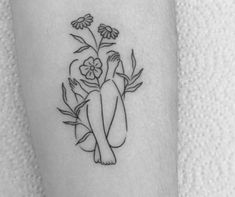 a woman's arm with flowers on it and the words, i love you