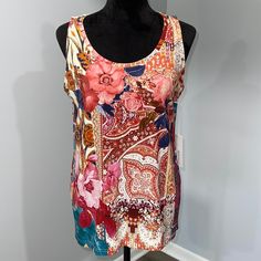 Chico’s Size Medium Touch Of Cool Basic Knit Top Sleeveless Floral Print New With Tags Condition Stretches Well - Rayon Spandex Material Smoke Free Home Multicolor Stretch Cami Top, Spring Multicolor Stretch Vest, Stretch Multicolor Cami Top, Stretch Floral Print Cami Tank Top, Multicolor Floral Print Summer Vest, Multicolor Summer Vest, Spring Multicolor Stretch Tank Top, Multicolor Vest-style Cami Tops, Multicolor Fitted Sleeveless Camisole