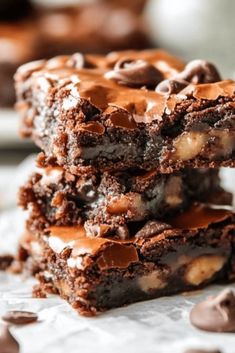 three chocolate brownies stacked on top of each other