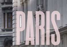 the word paris is displayed in front of an old building