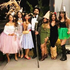 a group of people dressed up in costumes