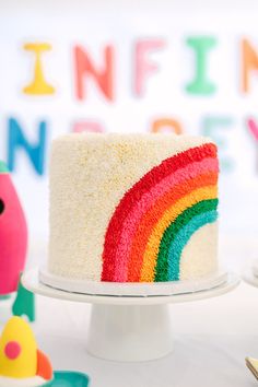 there is a cake that has been made to look like a rainbow