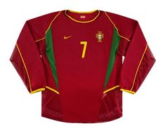 a soccer jersey with the number seven on it, in red and green color scheme