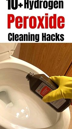 a person in yellow gloves is cleaning a toilet