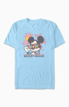 Online only! Who knew that dressing "mousey" could be so cute? Celebrate Walt Disney's most iconic character with these officially licensed Mickey Mouse and Friends styles! All of your favorites, like Mickey Mouse, Minnie Mouse, Goofy, Pluto, Donald Duck, and more, are featured across these adorable Mickey designs that are perfect for your next trip to Disneyland! The Beach Mickey Mouse T-Shirt features a crew neckline, short sleeves, and a front graphic for that classic look.&nbs Disney Crew Neck T-shirt For Summer, Disney Summer Cartoon Print T-shirt, Disney Character Print Summer T-shirt, Disney T-shirt For Summer Fan Merchandise, Disney Fan Merchandise T-shirt For Summer, Summer Disney Fan Merchandise T-shirt, Mickey Mouse Short Sleeve Summer Top, Blue Mickey Mouse Fun T-shirt, Blue Mickey Mouse T-shirt