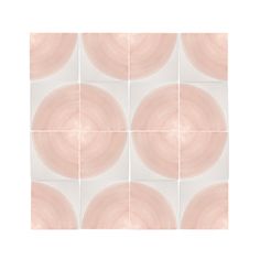 a white and pink tile pattern with circles on the bottom, in different shades of pink