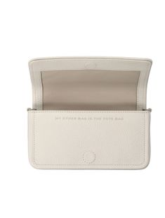 Imagine your essentials tucked neatly in a chic, compact companion that’s as stylish as it is practical. Crafted from full grain leather, it's perfect for those who love a dash of elegance with functional design. You’ll love how seamlessly it fits into your everyday adventures. Full grain leather construction Convenient crossbody design Secure magnetic closure Front embossed logo for a touch of style Removable and adjustable web strap One main compartment with an inner slip pocket 8 card slots f Leather Mini Bag, White Shoulder Bag, Stella Mccartney Bag, American Fashion Designers, Golden Goose Shoes, Green Shoes, Card Holder Leather, Leather Mini, Cotton Bag