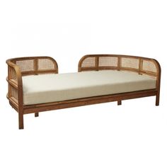 a wooden daybed with white cushions on the top and bottom part, in front of a white background