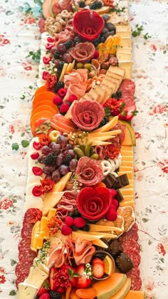 a long table topped with lots of different types of food