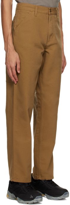 Relaxed-fit 12 oz organic cotton canvas trousers. · Belt loops · Five-pocket styling · Zip-fly · Utility pockets · Hammer loop · Textile logo patch at back Supplier color: Hamilton brown Painters Pants, Canvas Pants, Fly Logo, Carhartt Work In Progress, Men Carhartt, Utility Pockets, Textile Logo, Carhartt Mens, Casual Trousers