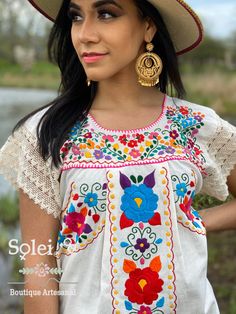 This Beautiful Hand Embroidered Blouse is full of colorful florals and beautiful lace sleeves that will make you stand out at any event. Bohemian Lace Top With Floral Print, Multicolor Lace Tops For Spring, Festival Lace Tops With Short Sleeves, Multicolor Bohemian Blouse With Lace Trim, Bohemian Multicolor Lace Trim Blouse, Bohemian Blouse With Lace Trim, Bohemian Multicolor Top With Embroidered Neckline, Bohemian Multicolor Tops With Embroidered Neckline, Bohemian Short Sleeve Blouse For Festival