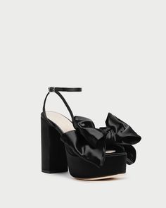 Shop the Kiki Black Satin Platform Sandal at Loefflerrandall.com Evening Sandals With Satin Bow And Round Toe, Evening High Heel Sandals With Bow, Evening Sandals With Bow And Open Heel, Luxury Party Sandals With Satin Bow, Chic Platform Sandals For Gala, Platform Sandals With Block Heel For Gala, Open Toe Sandals With Bow For Gala, Chic Evening Sandals With Satin Bow, Leather Bow Heels For Party